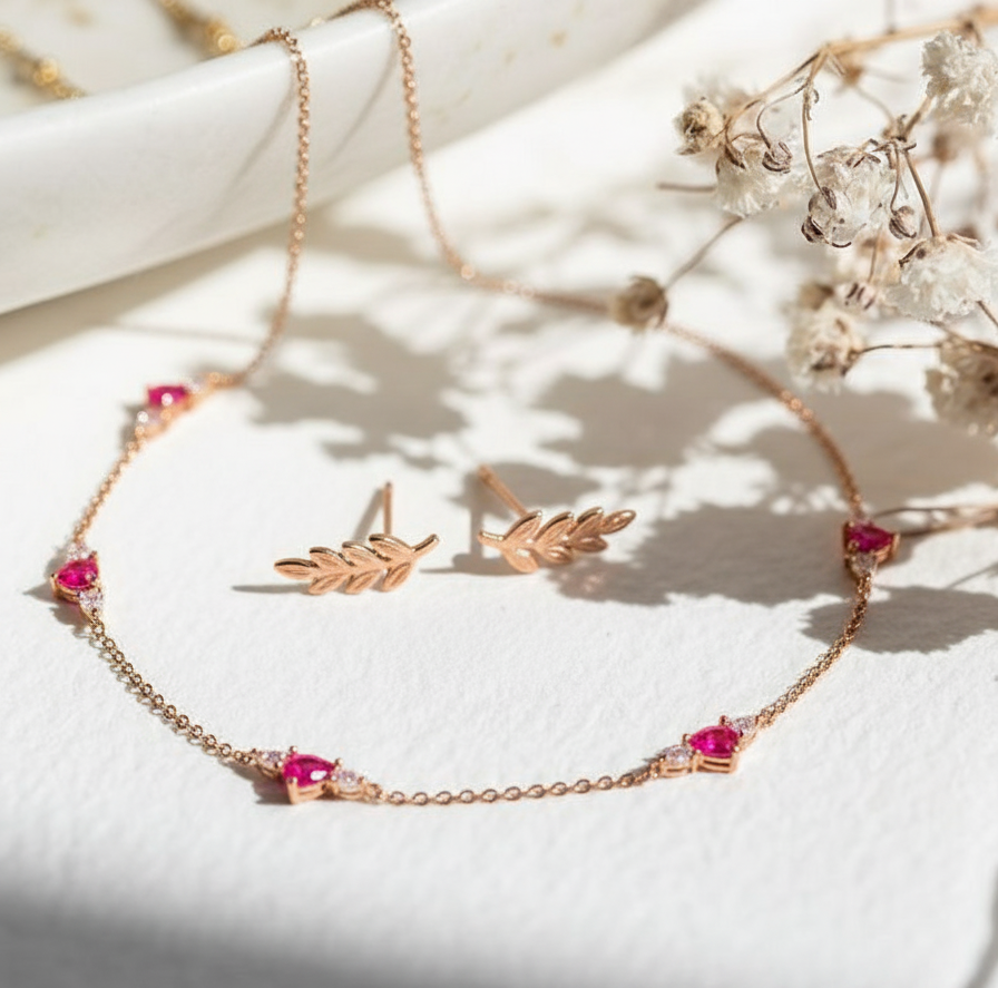 Minimalistic jewellery placed on elegant white background