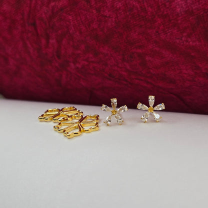 Gold-plated flower studs with shimmering crystal petals arranged in a symmetrical bloom design, suitable for both casual and festive styling