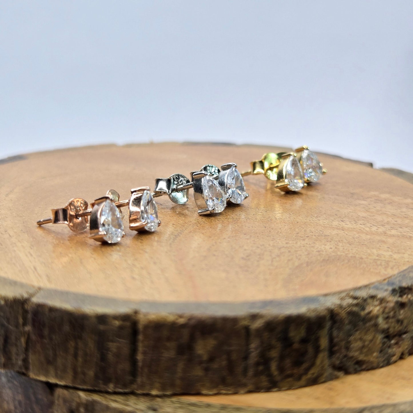 925 sterling silver Aurelia pear-cut stud earrings for women with gold prong setting