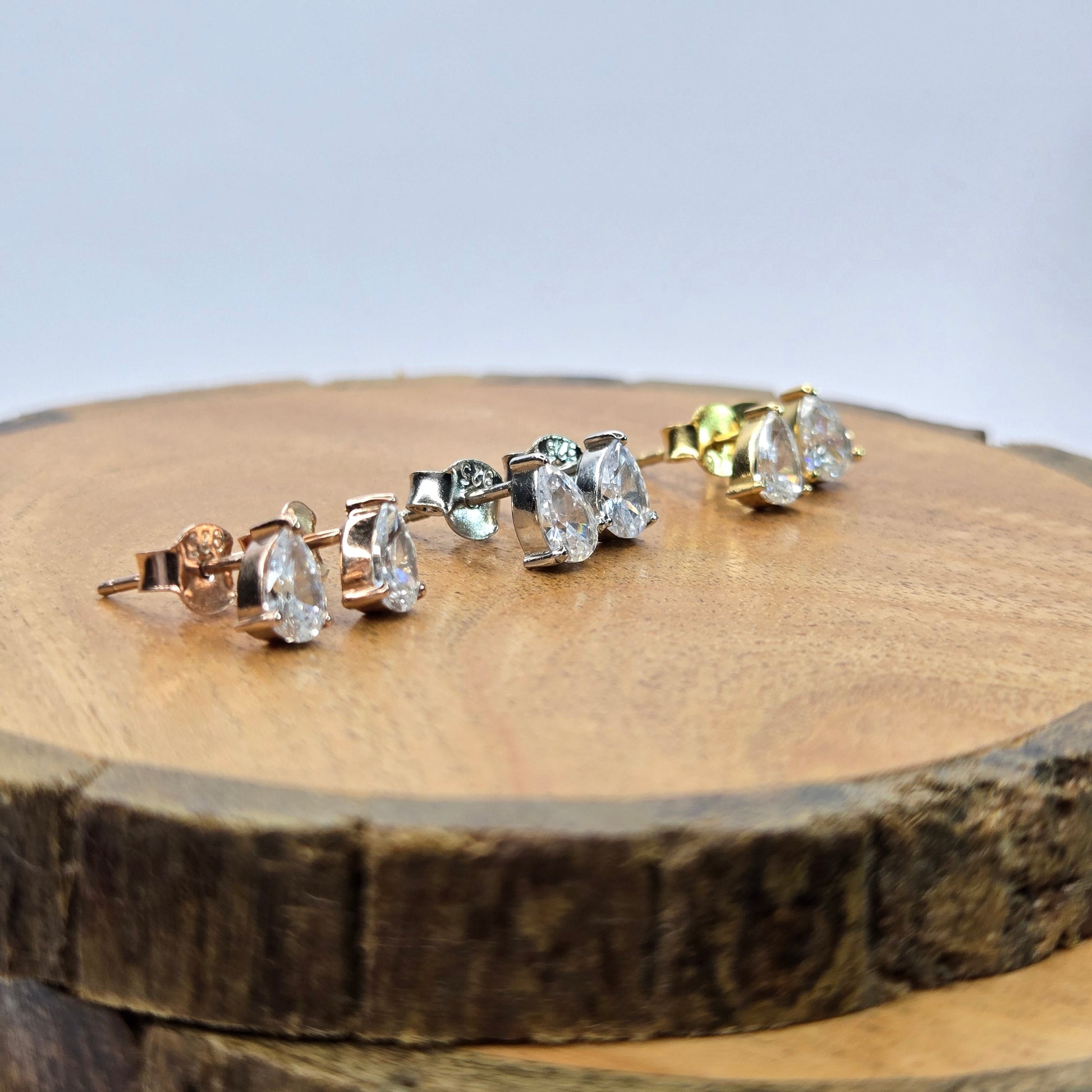 925 sterling silver Aurelia pear-cut stud earrings for women with gold prong setting