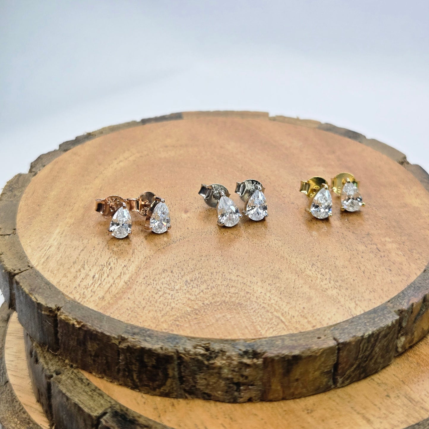 925 sterling silver Aurelia pear-cut stud earrings for women with gold prong setting