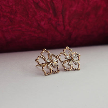 Rose-gold plated flower studs with shimmering crystal petals arranged in a symmetrical bloom design, suitable for both casual and festive styling