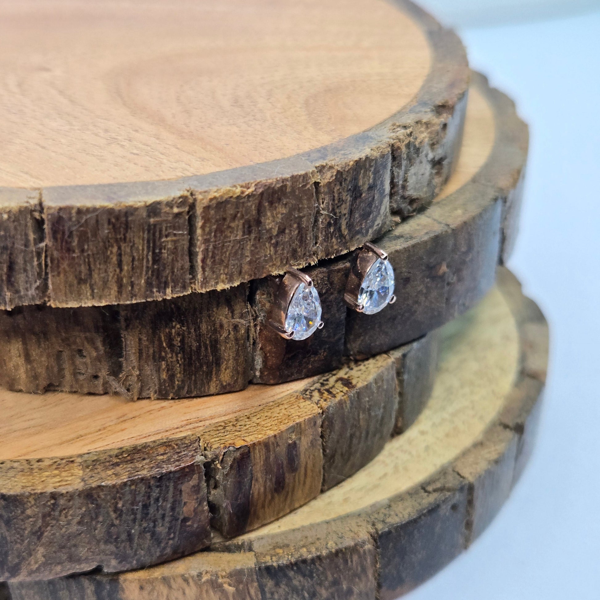 925 sterling silver Aurelia pear-cut stud earrings for women with gold prong setting