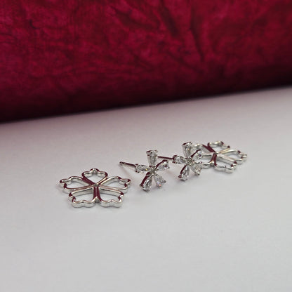 Rose-gold plated flower studs with shimmering crystal petals arranged in a symmetrical bloom design, suitable for both casual and festive styling