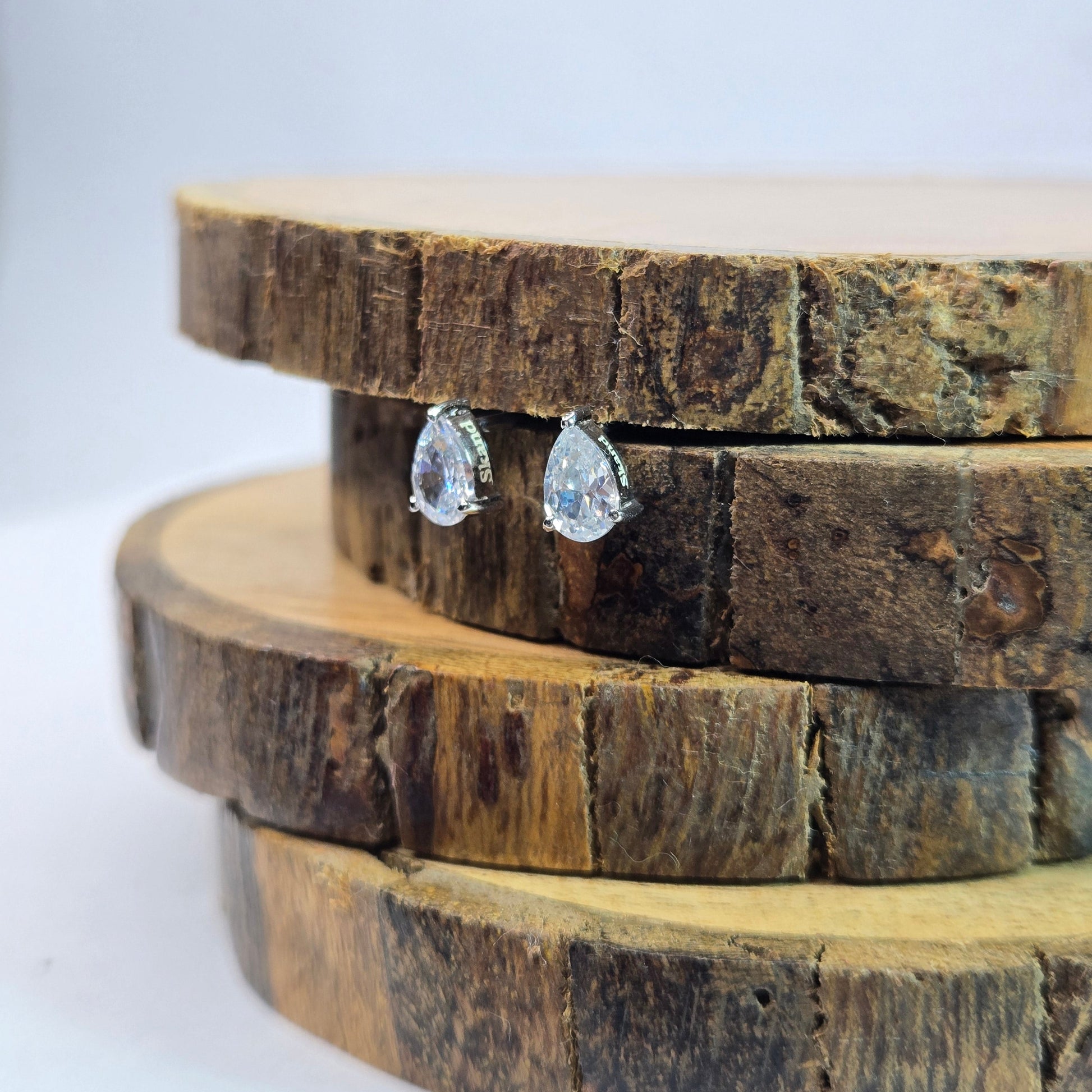 925 sterling silver Aurelia pear-cut stud earrings for women with gold prong setting