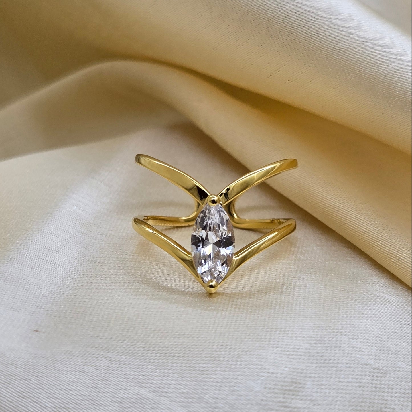 Gold-plated open band ring with a modern double-band design, featuring a marquise-cut clear zircon stone at the center offering refined sophistication for daily wear or special occasions.