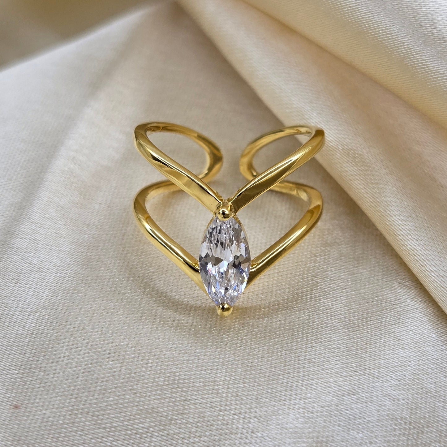 Gold-plated open band ring with a modern double-band design, featuring a marquise-cut clear zircon stone at the center offering refined sophistication for daily wear or special occasions.
