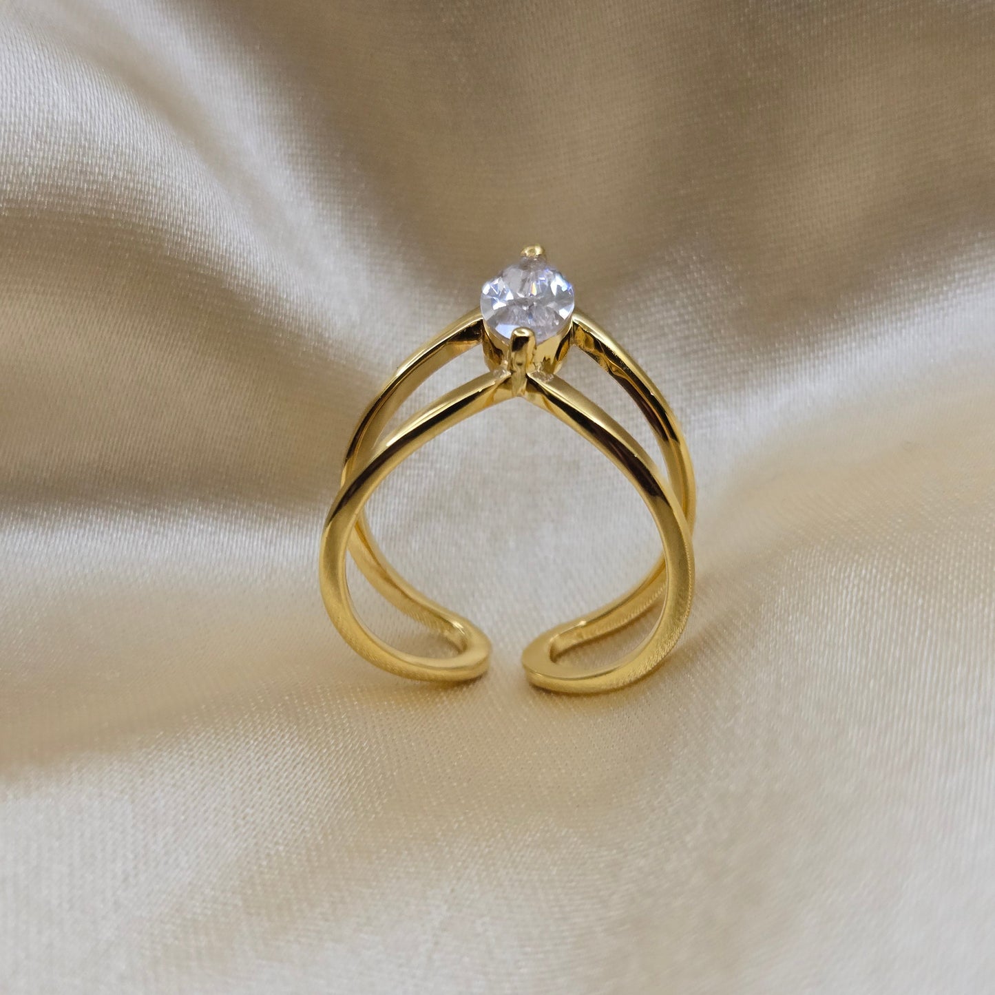 Gold-plated open band ring with a modern double-band design, featuring a marquise-cut clear zircon stone at the center offering refined sophistication for daily wear or special occasions.