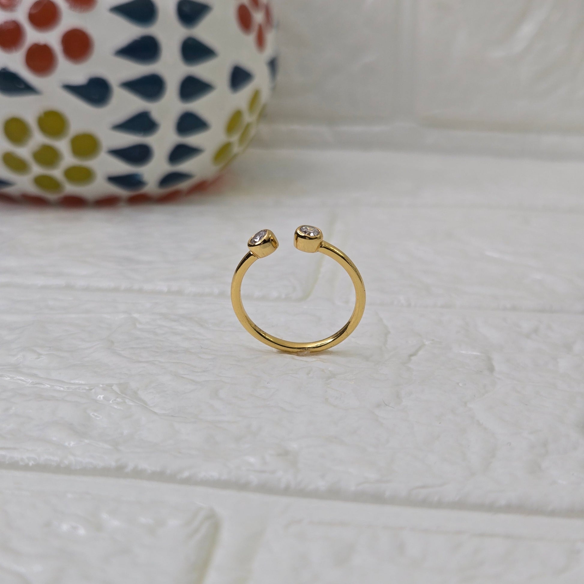 925 sterling silver Converge open ring for women with dual bezel-set stones in gold finish