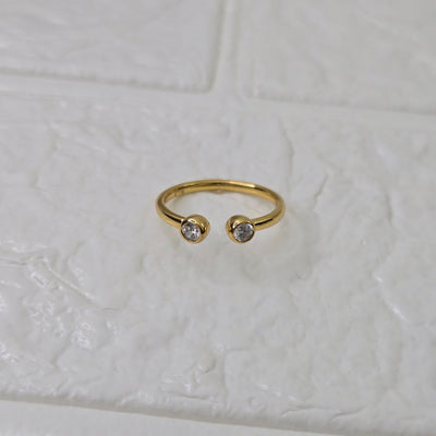 925 sterling silver Converge open ring for women with dual bezel-set stones in gold finish