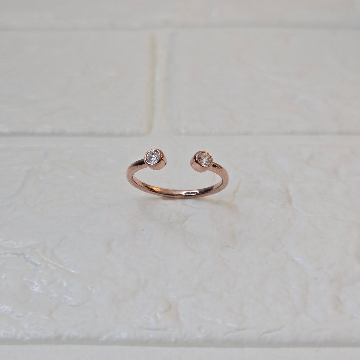 925 sterling silver Converge open ring for women with dual bezel-set stones in gold finish