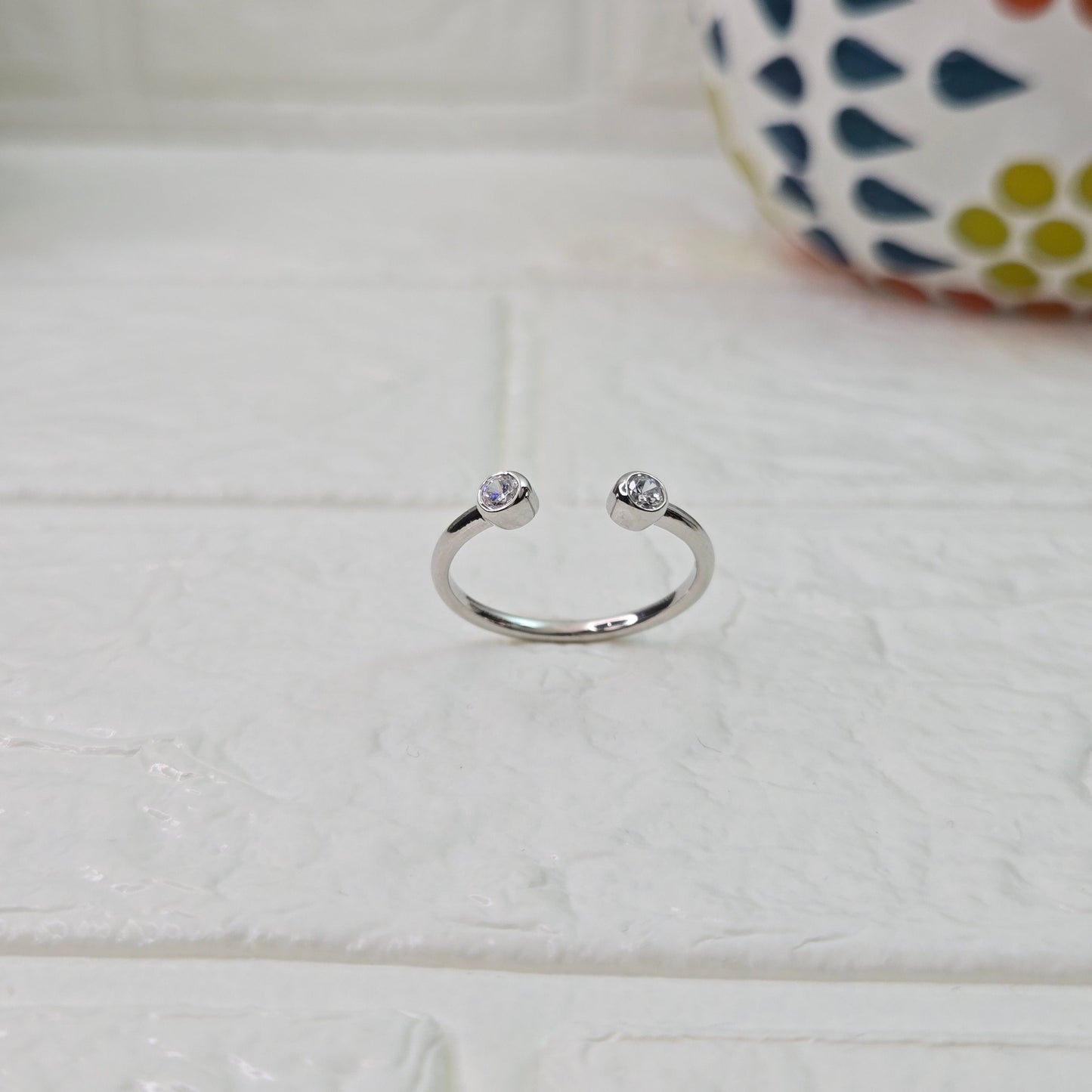 925 sterling silver Converge open ring for women with dual bezel-set stones in gold finish